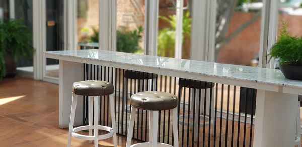 Close-up of glass window on table in restaurant