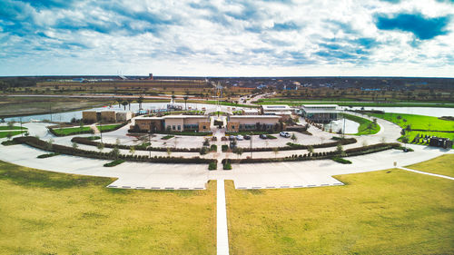 High angle view of castle on field against sky