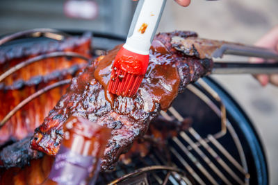 Close-up of meat on barbecue grill