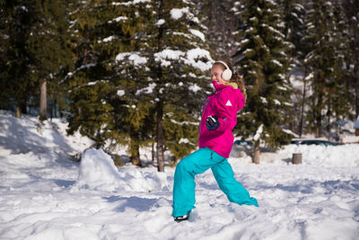 Full length of child on snow covered land