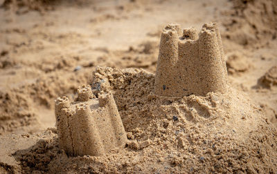 Close-up of sand castles