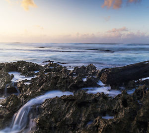 Scenic view of sea against sky during sunset