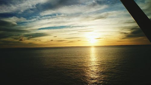 Scenic view of sea at sunset