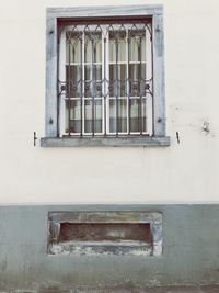 Low angle view of window on old building