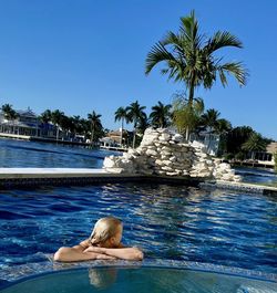 Woman swimming in pool