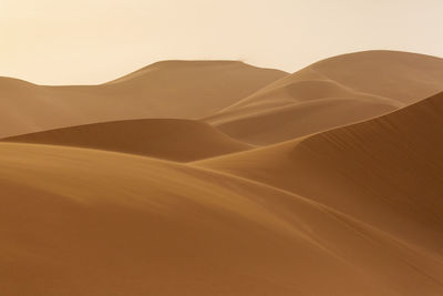 Scenic view of desert against clear sky