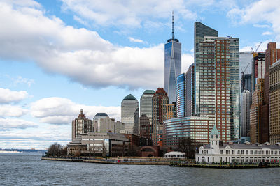 Buildings in city against sky