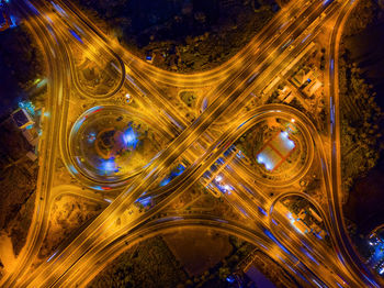 High angle view of light trails on road