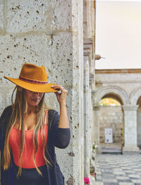 Tourist woman walking on vacation in street, arequipa, peru. selective focus