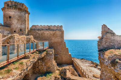 View of fort against clear blue sky