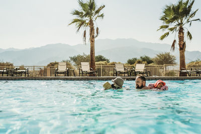 People swimming in pool