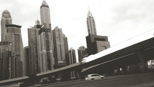 Low angle view of skyscrapers against sky