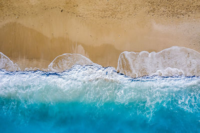 Sea waves splashing on rocks