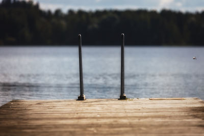 Close-up of wood against sea