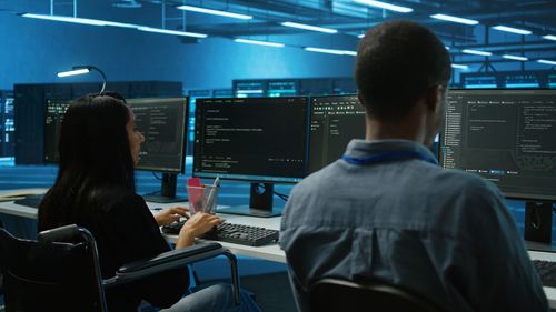 Rear view of man standing in cafe