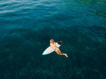 High angle view of man swimming in sea