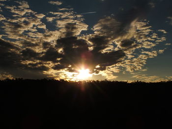 Scenic view of silhouette landscape against sky during sunset