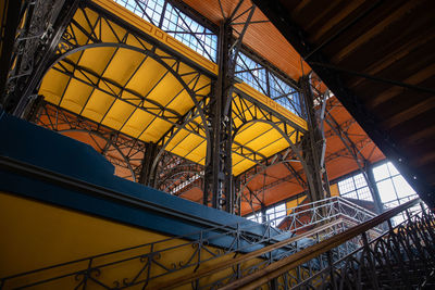Low angle view of yellow ceiling