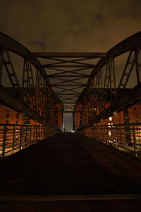 Bridge in city at night