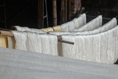 Close-up of towels on bed at home