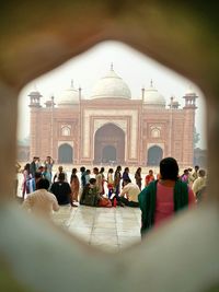 Mosque near taj mahal seen through hole