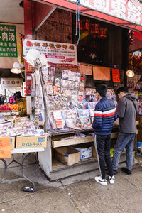 People in store for sale at market