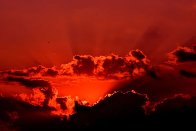 Low angle view of dramatic sky during sunset