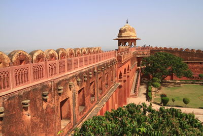 Exterior of historic building against clear sky