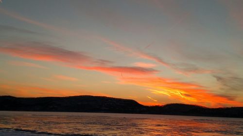 Scenic view of mountains at sunset