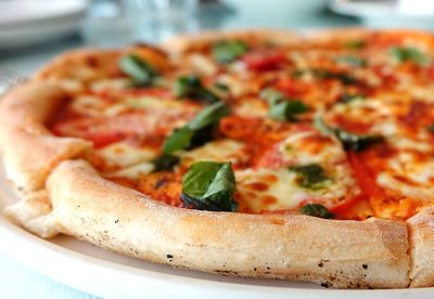 Close-up of pizza served in plate