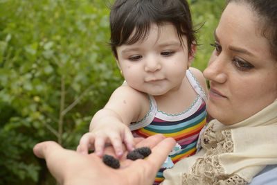 Portrait of mother and daughter baby