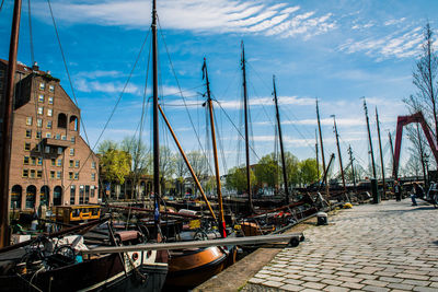 Boats moored at harbor