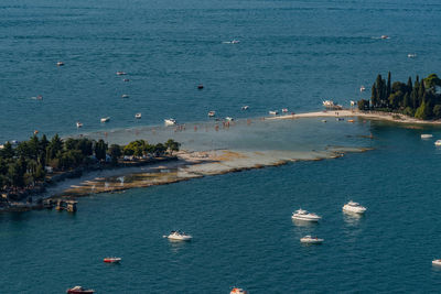 High angle view of sea against blue sky