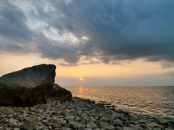 Scenic view of sea against sky during sunset