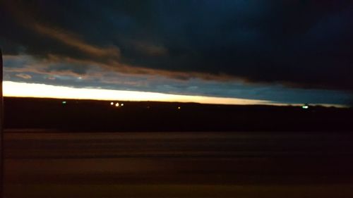 Scenic view of dramatic sky at dusk