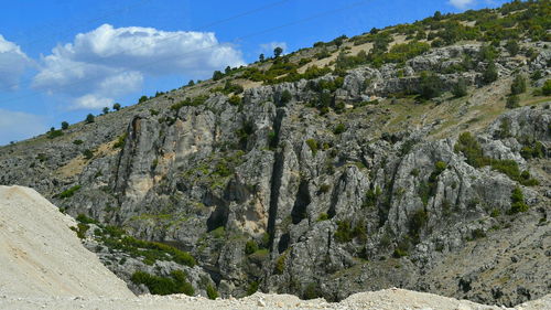 Scenic view of rocky mountains against sky