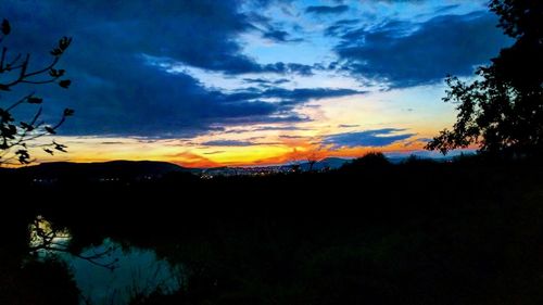 Scenic view of dramatic sky during sunset