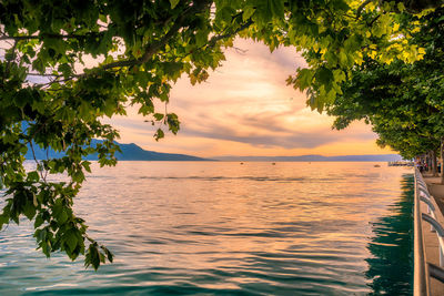 Scenic view of sea against sky at sunset