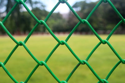 Full frame shot of chainlink fence in playground