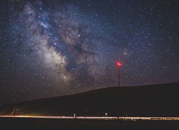 Scenic view of illuminated star field against sky at night