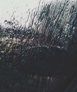 Close-up of wet window in rainy season