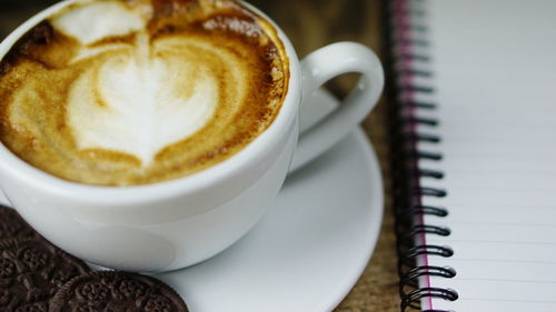 High angle view of cappuccino on table