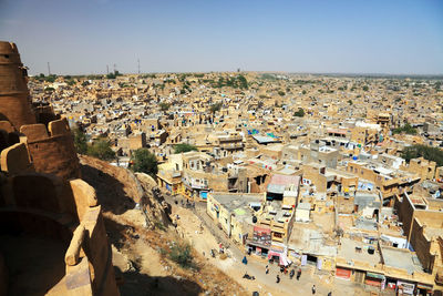 Aerial view of townscape against sky