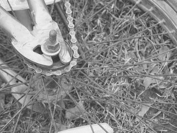Close-up low section of child on chain