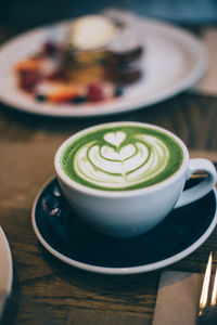 Coffee cup on table