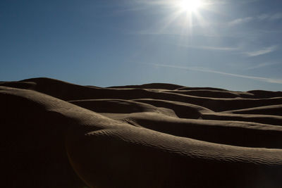 Sun shining through clouds