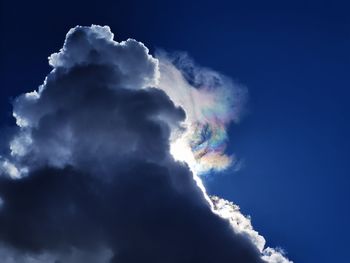 Low angle view of rainbow in sky