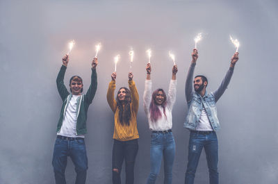 Group of people standing against the sky