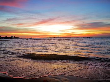 Scenic view of sea against sky during sunset