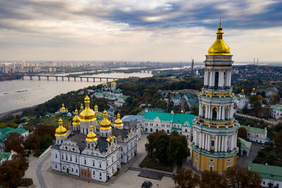 Panoramic view of buildings in city against sky